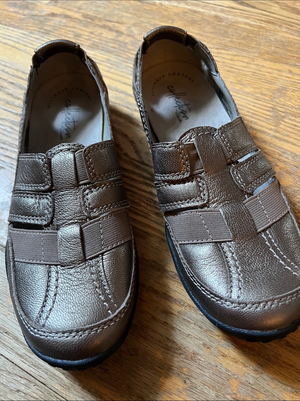 Clark’s women’s slip on shoes in bronze size 6 1/2